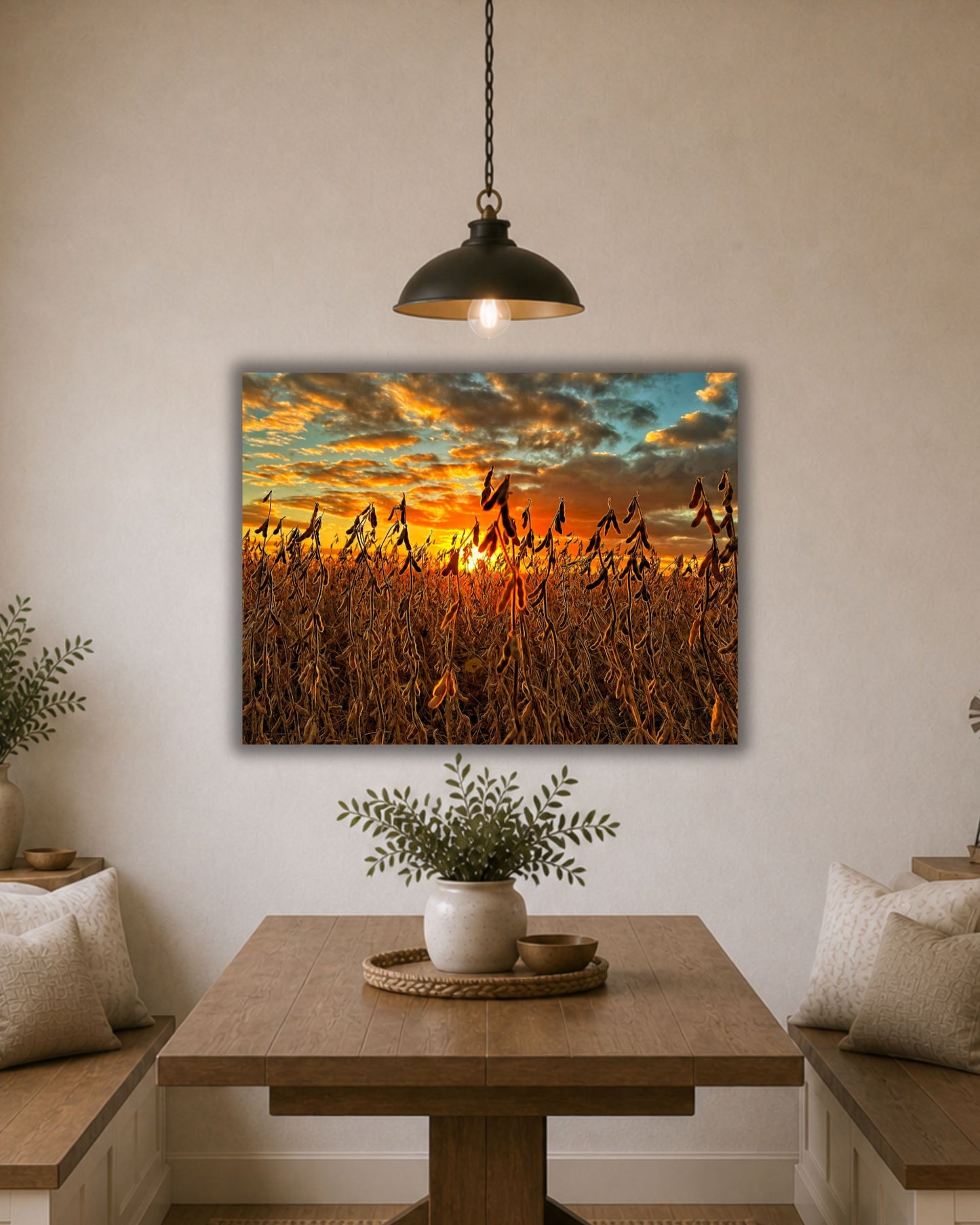 Soybean field sunset canvas wall art displayed above a dining table in a warm farmhouse breakfast nook.