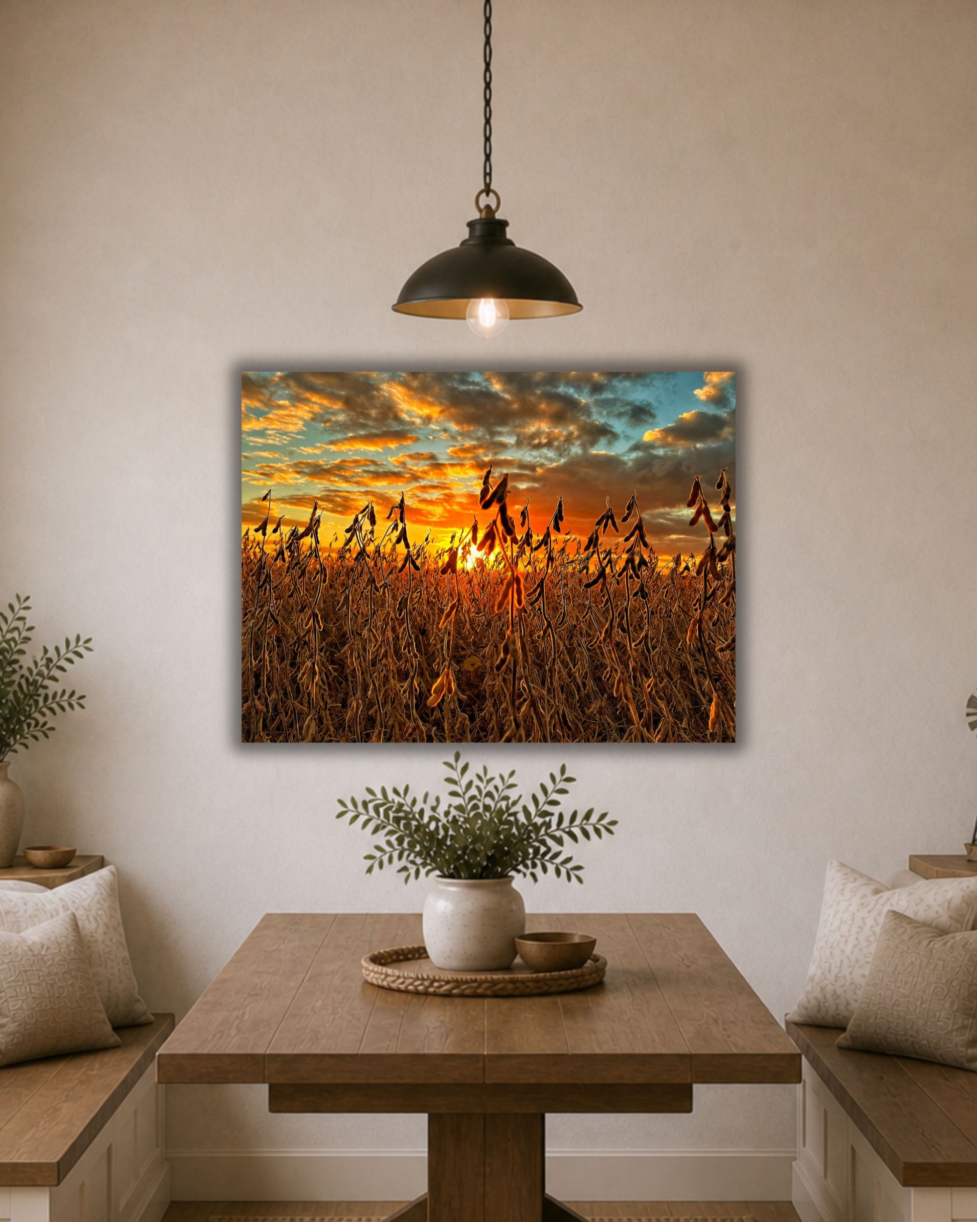 Soybean field sunset canvas wall art displayed above a dining table in a warm farmhouse breakfast nook.